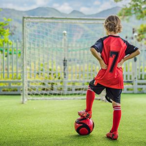 Kid playing football